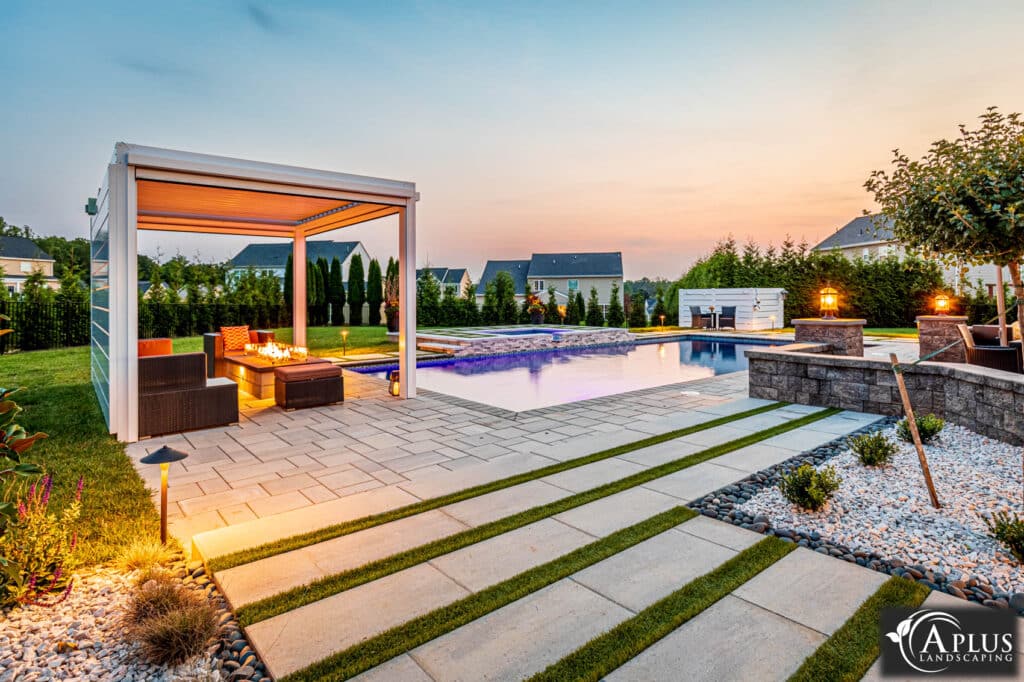 a modern swimming pool and patio design hardscape installation in pennsylvania